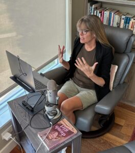 photo of Heidi sitting in front of her laptop, on zoom